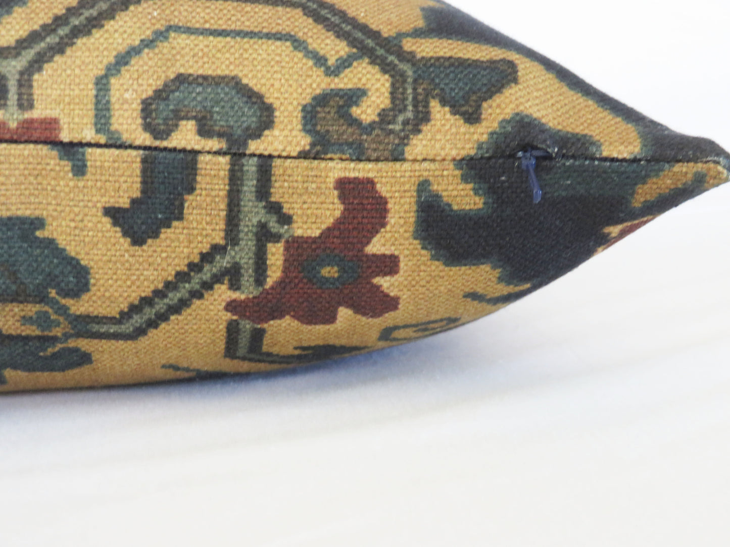 Southwest mptif pillow cover in navy, teal, tan, and rust