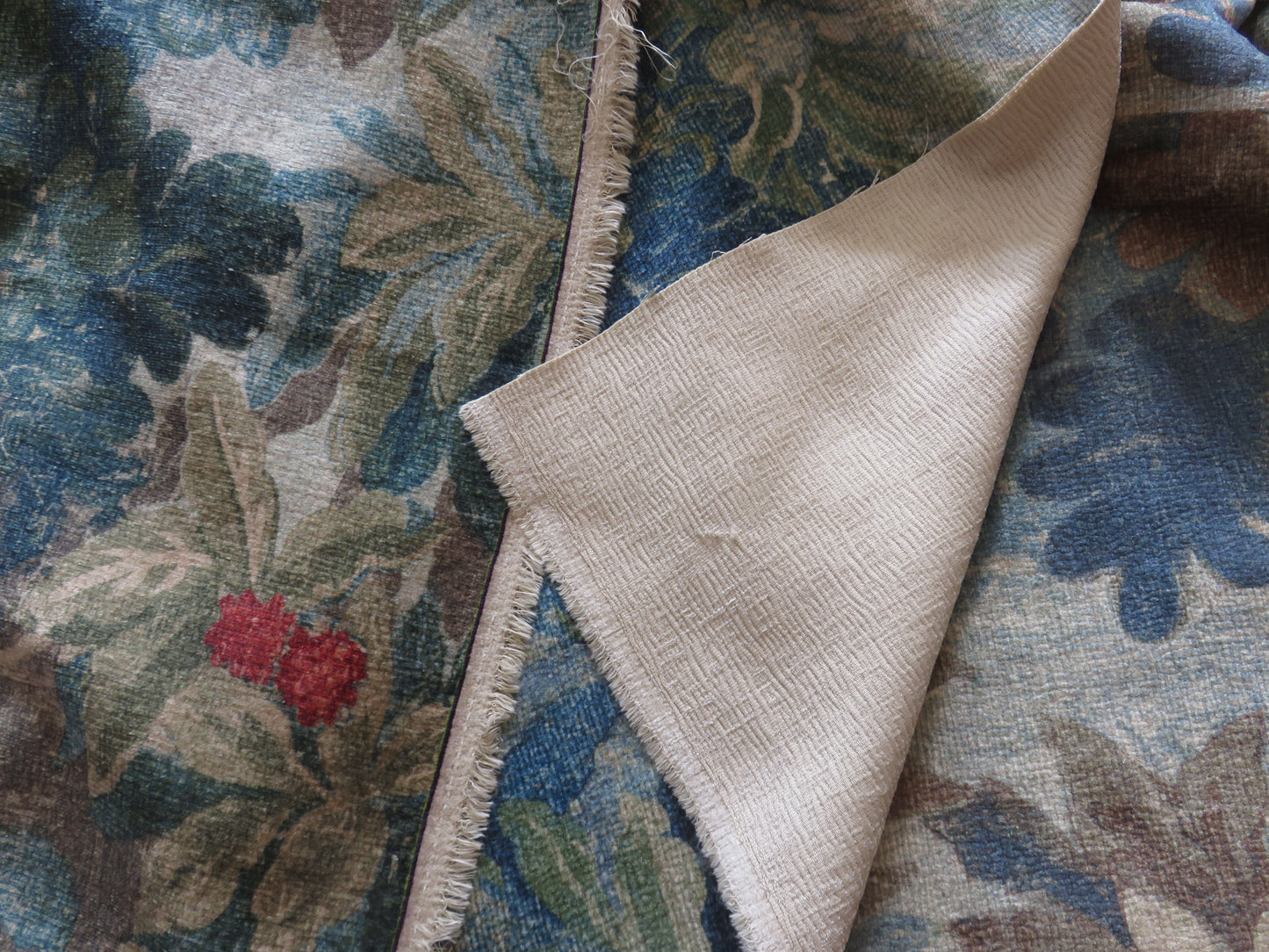 three colorways of a chenille upholstery fabric featuring a large scale verdure tapestry print of trees and leaves - fabric is Bucolic by PK Lifestyle