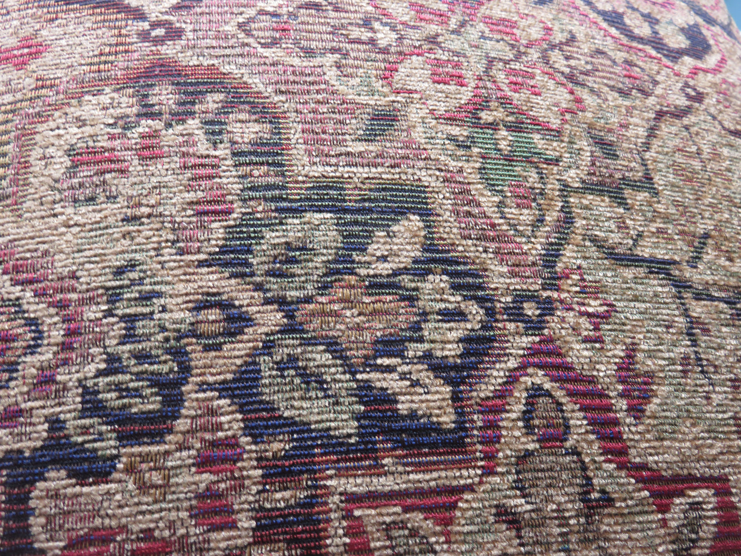 jewel tone chenille medallion pillow cover with a quatrefoil motif in gold, red, green, and blue