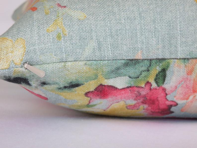 aqua floral pillow cover of Covington Macbeth Eggshell Blue