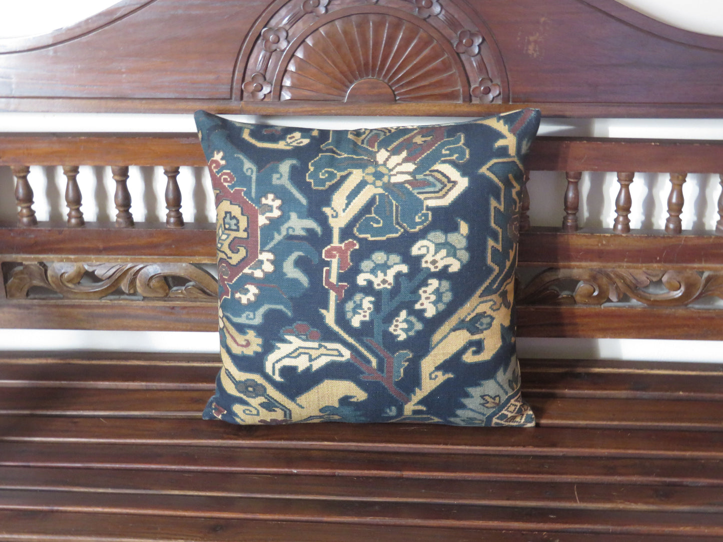 Southwest mptif pillow cover in navy, teal, tan, and rust