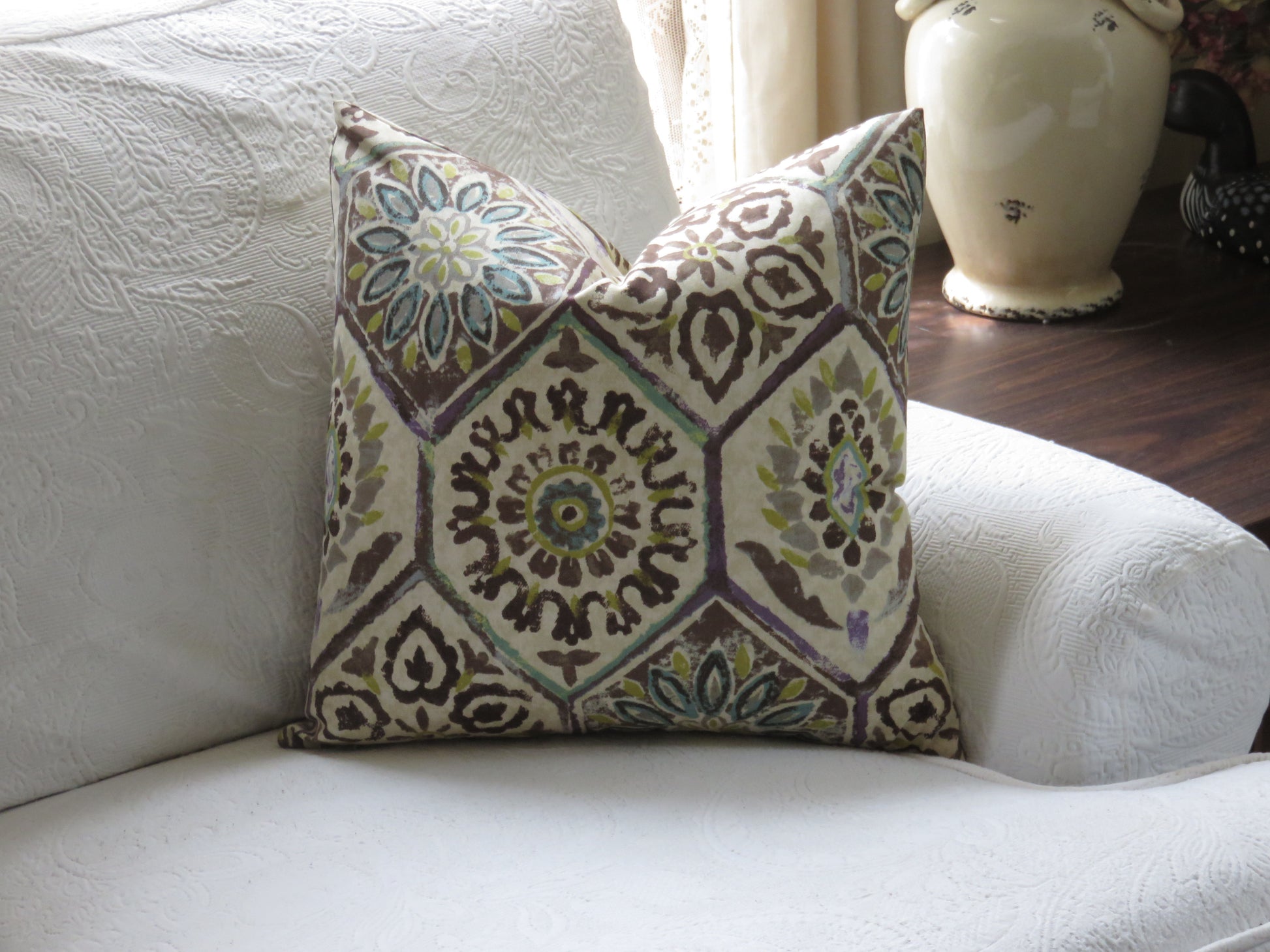 hexagonal tile print pillow cover in brown teal lime and purple