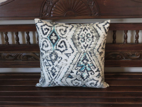 ikat linen pillow cover in indigo blue, grey, and turquoise
