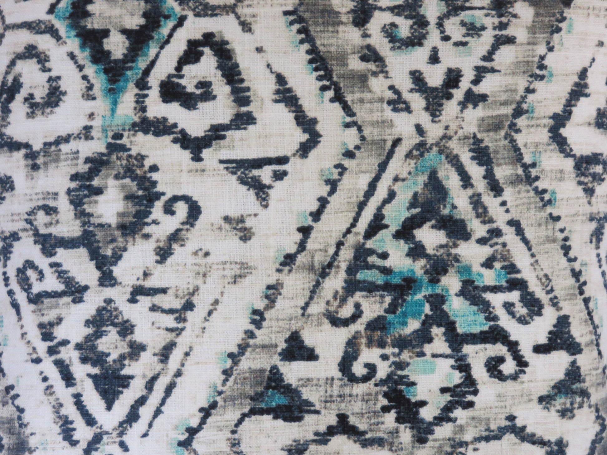 ikat linen pillow cover in indigo blue, grey, and turquoise