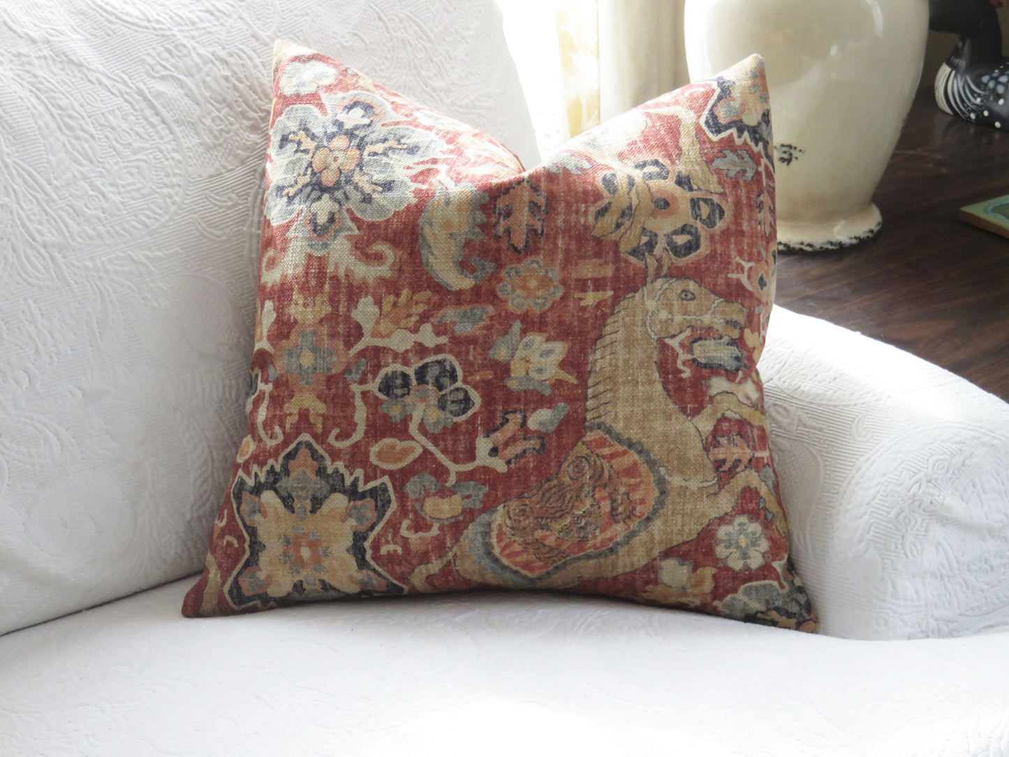 rusty red asian horse pillow cover, made from P kaufmann nangchen pony in crimson fabric