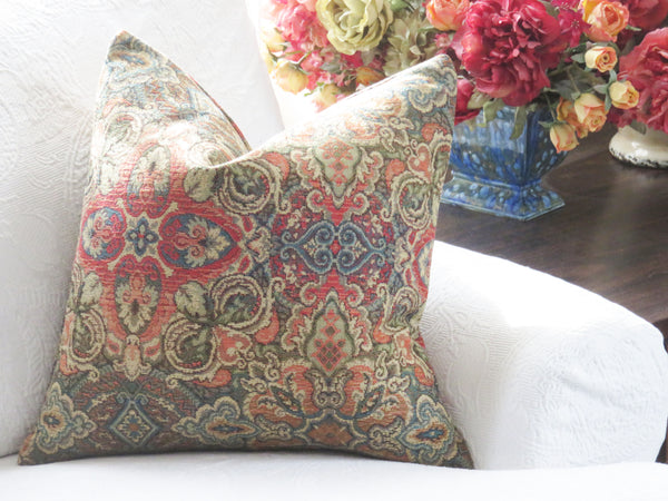 colorful medallion tapestry pillow cover in orange, blue, red, and green