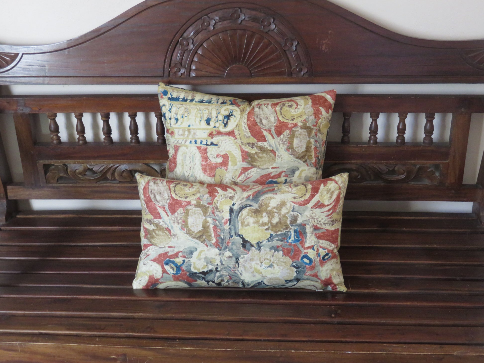 terracotta orange and indigo blue pillow cover with urn and floral motif, mag=de from Waverly Di Castello in Henna cotton fabric