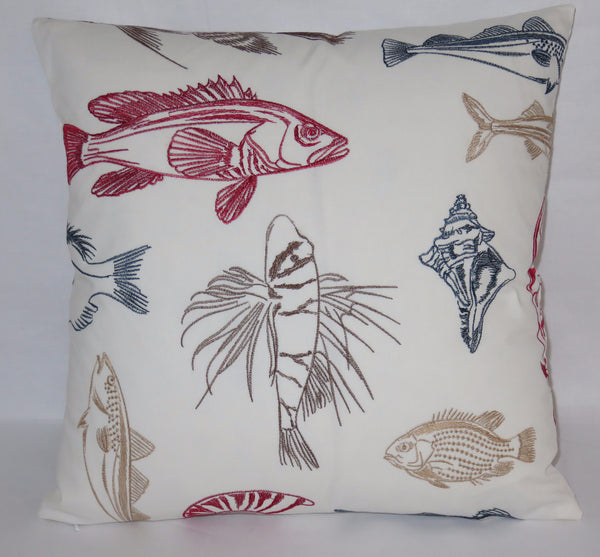White embroidered sea life pillow