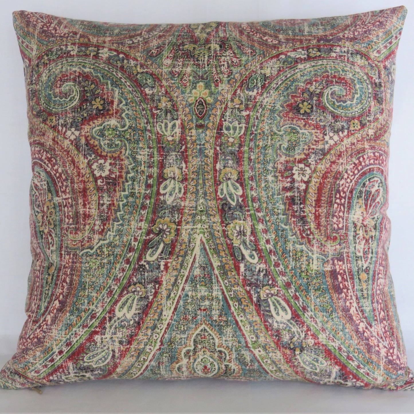 colorful distressed paisley pillow cover in teal, red, green