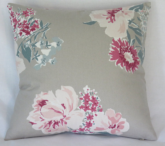 taupe pillow with pink floral pillow