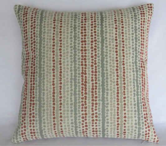 terracotta orange and grey rows of dots pillow