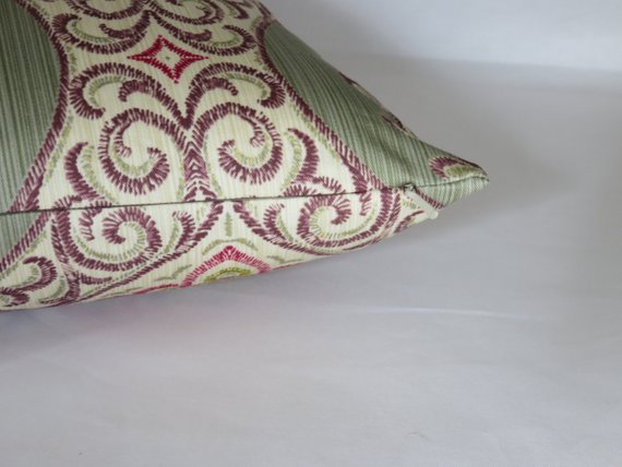 sage green ogee medallion pillow with purple, fuchsia, and metallic gold