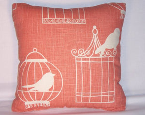 coral orange bird cage pillow