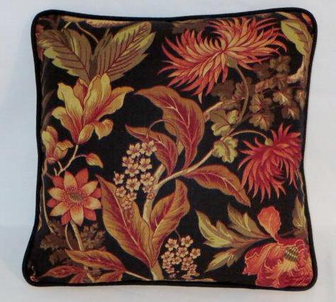 black and orange tropical floral pillow